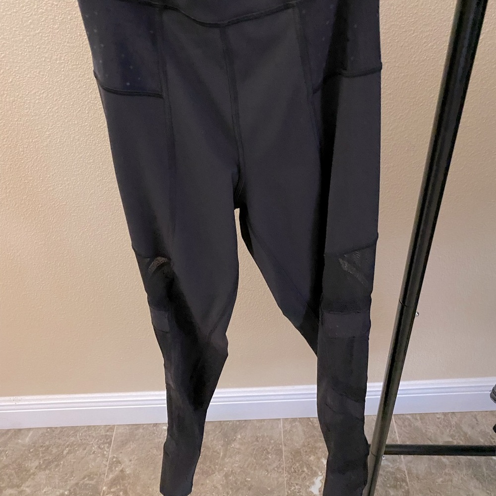 Rare Lululemon high rise Luxtreme with mesh cutouts on side size 2